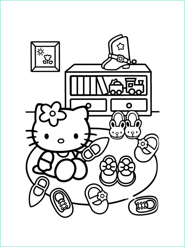 coloriage hello kitty joue avec ses chaussures