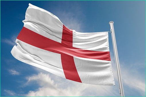 drapeau anglais est onduler contre le ciel bleu gm
